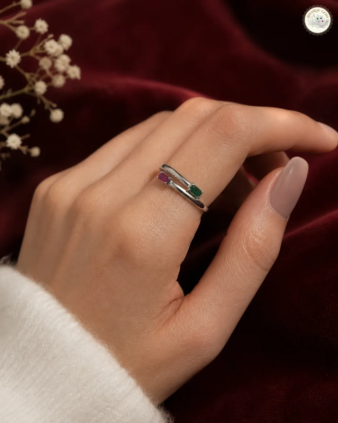 A master jeweler's hands meticulously setting a delicate gemstone into a rose gold ring base